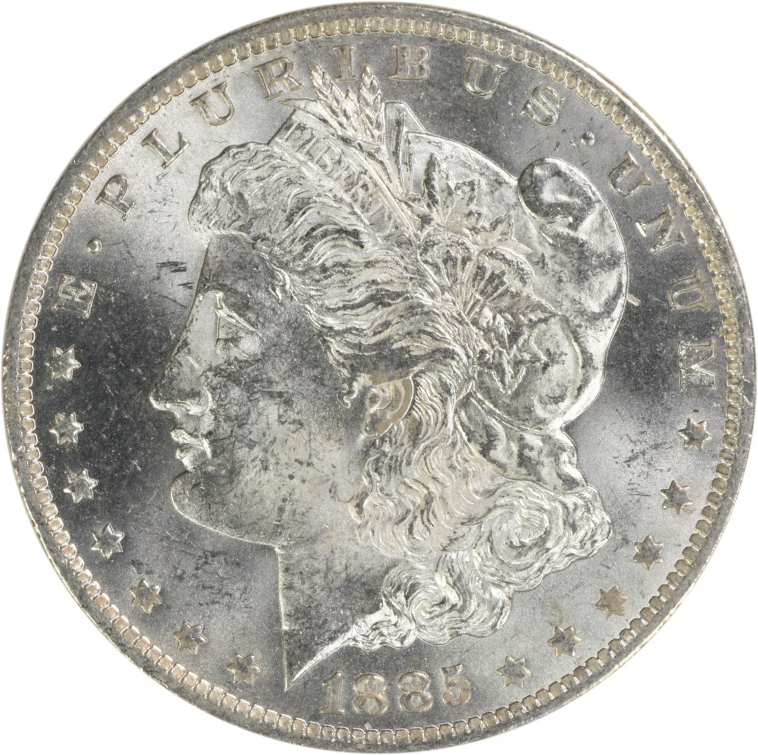 1885-O Morgan Silver Dollar Uncertified Brilliant Uncirculated: 1885-O Morgan Silver Dollar Uncertified Brilliant Uncirculated This 1885-O Morgan Silver Dollar is a stunning example of uncirculated coinage, showcasing the beautiful details characteristic of the Mo