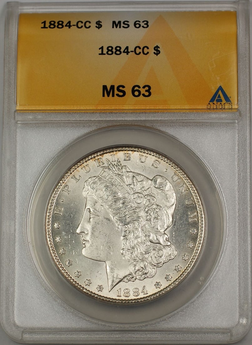 ANACS MS 63 1884 Carson City Morgan Silver Dollar with Light Toning: ANACS MS 63 1884 Carson City Morgan Silver Dollar with Light Toning This 1884-CC Morgan Silver Dollar is a highly collectible coin minted at the Carson City Mint. Certified by ANACS with a grade of MS