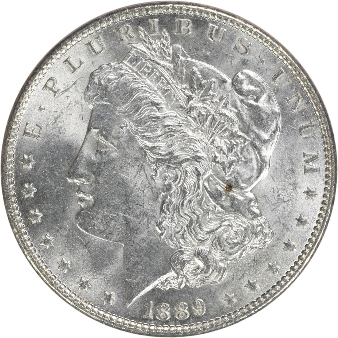1889 Morgan Silver Dollar BU Uncertified Silver Coin: 1889 Morgan Silver Dollar BU Uncertified Silver Coin This 1889 Morgan Silver Dollar is a stunning example of American numismatic history. Graded as Brilliant Uncirculated (BU), this coin showcases the