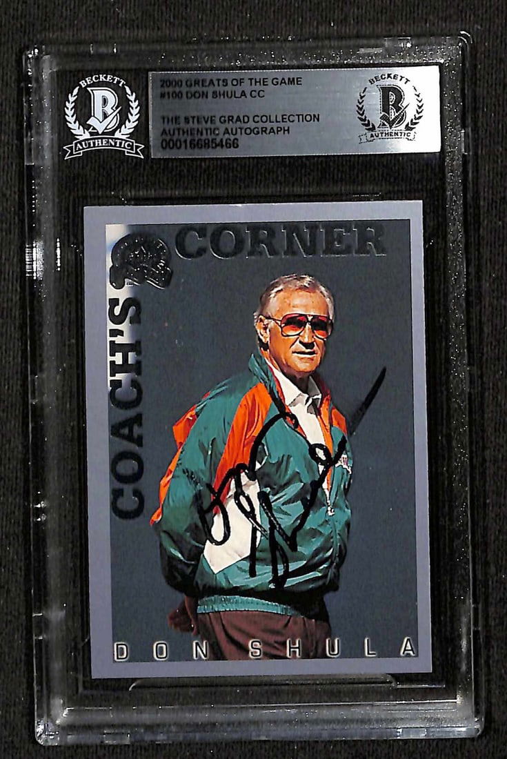 Don Shula Signed 2000 Greats of the Game Card Beckett Authenticated: Don Shula Signed 2000 Greats of the Game Card Beckett Authenticated This is a signed 2000 Greats of the Game #100 sports trading card featuring the legendary Miami Dolphins coach and Pro Football Hall