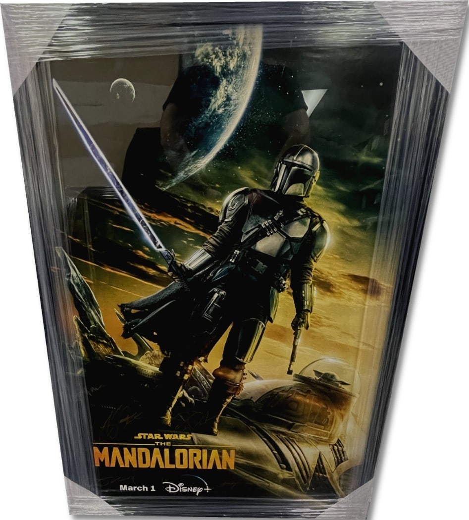 Star Wars The Mandalorian Cast Signed Poster Framed JSA Authenticated: Star Wars The Mandalorian Cast Signed Poster Framed JSA Authenticated This striking Star Wars The Mandalorian cast poster features the autographs of prominent figures including Pedro Pascal, Jon Favre