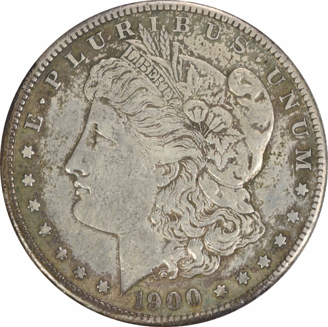 1900-S Morgan Silver Dollar EF Uncertified 90% Silver Coin: 1900-S Morgan Silver Dollar EF Uncertified 90% Silver Coin This 1900-S Morgan Silver Dollar is a classic piece, featuring a design by George T. Morgan. The coin is composed of 90% silver and 10% coppe