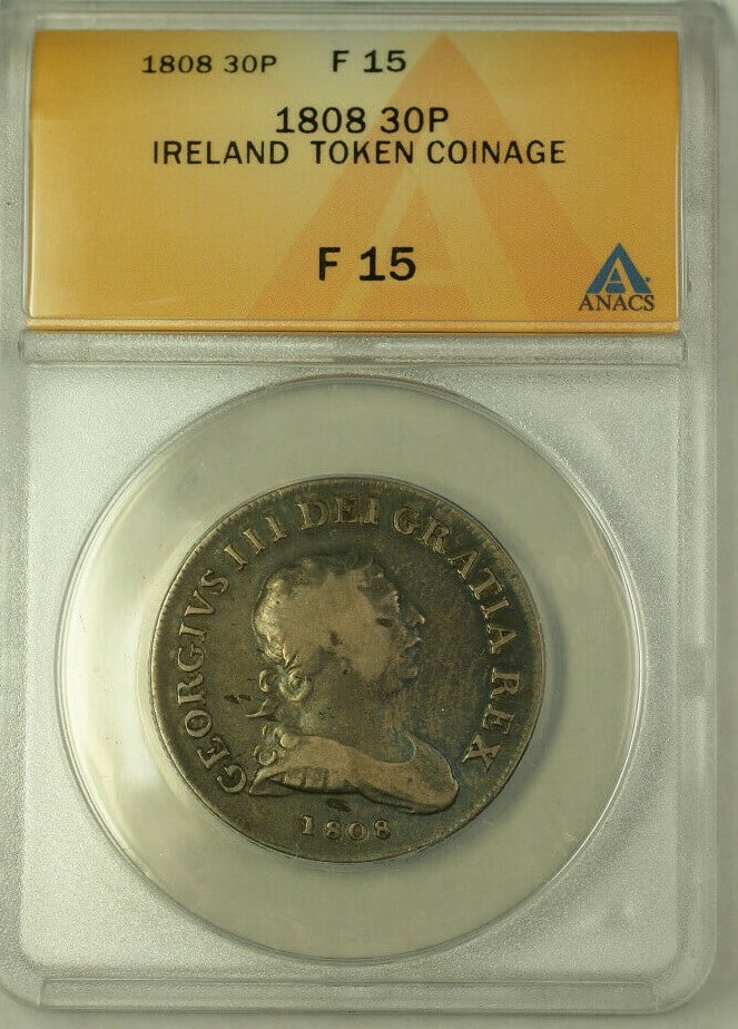 Ireland 1808 Silver 30 Pence Token ANACS F 15 Certified KM Tn4: Ireland 1808 Silver 30 Pence Token ANACS F 15 Certified KM Tn4 This is a 1808 Ireland 30 Pence token coin, certified by ANACS with a grade of F 15. The coin is composed of silver and has circulated. I