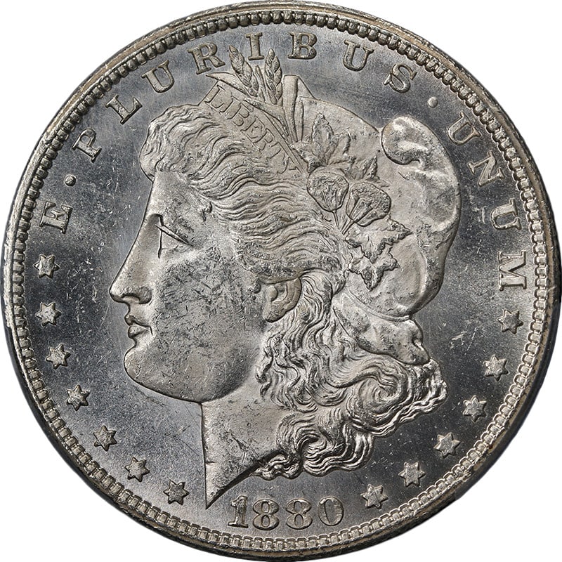 PCGS MS63 1880 Carson City Morgan Dollar Uncirculated Silver Blast White: PCGS MS63 1880 Carson City Morgan Dollar Uncirculated Silver Blast White This original 1880-CC Morgan Silver Dollar is certified by PCGS with a grade of MS63. The coin features a blast white appearanc