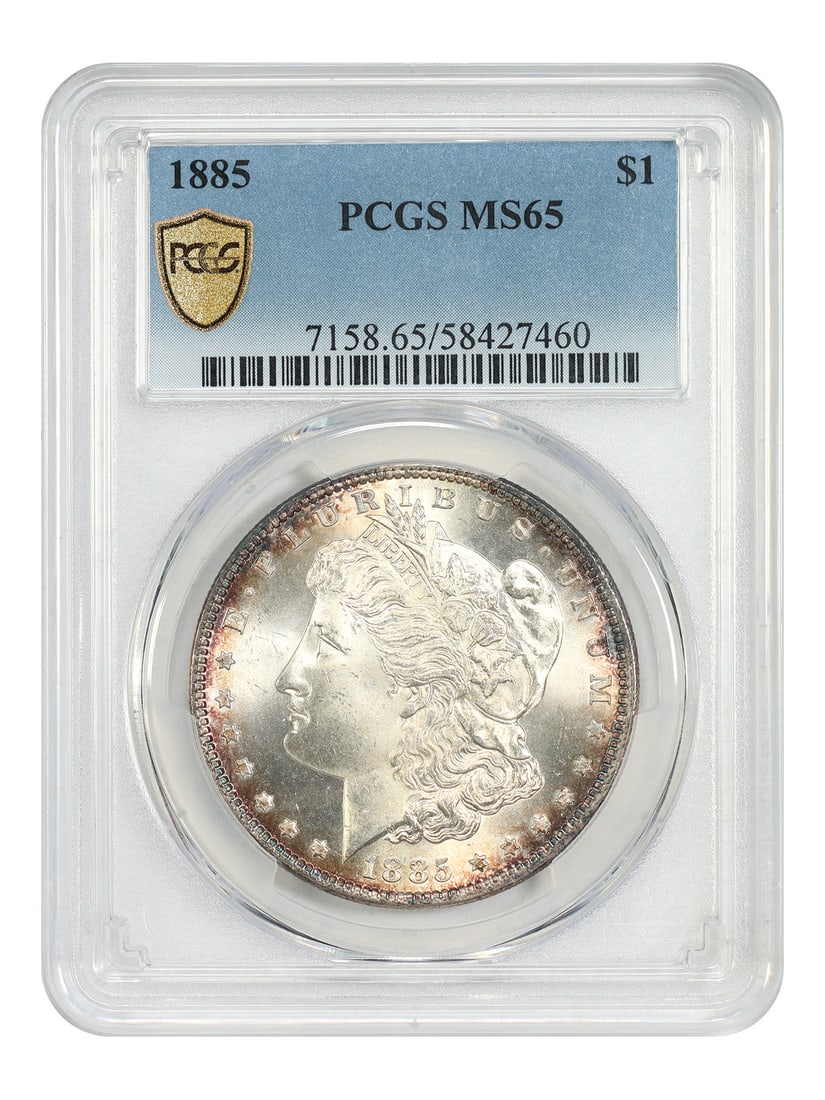 PCGS MS65 1885 Morgan Silver Dollar Philadelphia Mint Uncirculated: PCGS MS65 1885 Morgan Silver Dollar Philadelphia Mint Uncirculated This is an 1885 Morgan Dollar graded MS65 by PCGS. The coin is uncirculated and originates from the Philadelphia Mint. It is part of