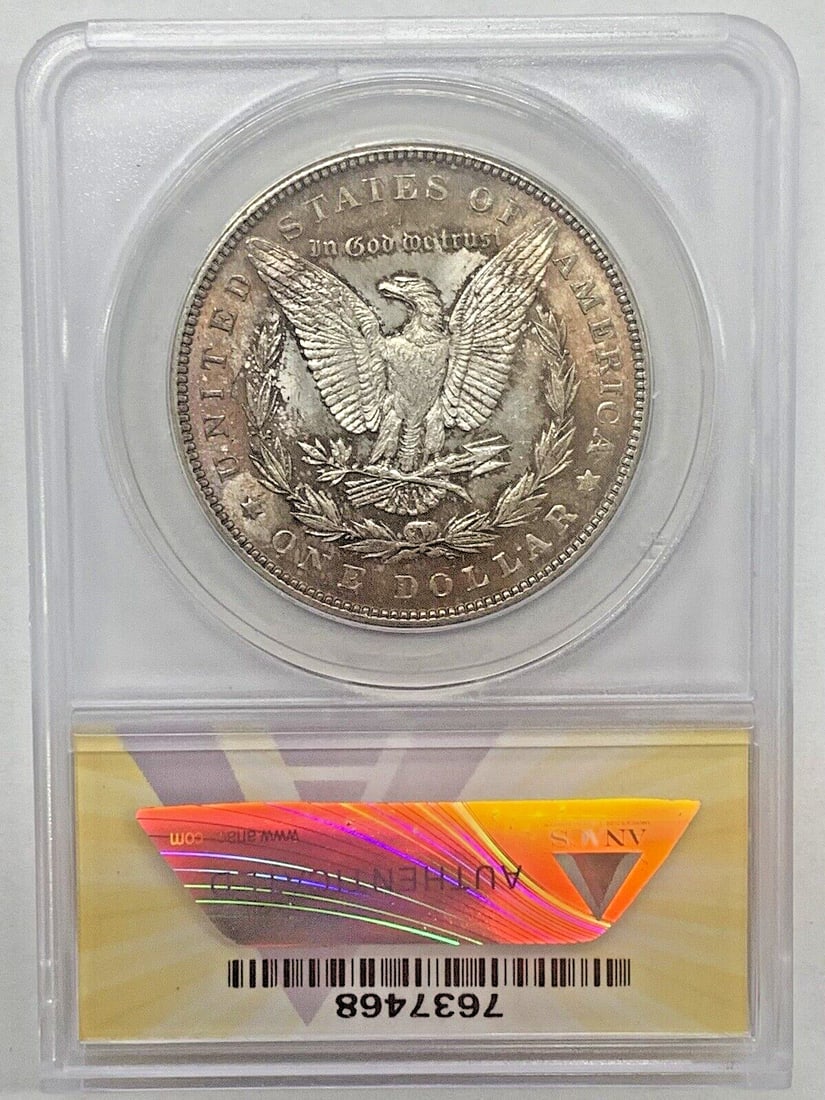 Rainbow Toned 1888 Morgan Silver Dollar ANACS MS 63 Certified Coin: Rainbow Toned 1888 Morgan Silver Dollar ANACS MS 63 Certified Coin This 1888 Morgan Silver Dollar features a captivating rainbow tone and is certified by ANACS with a grade of MS 63. Uncirculated and