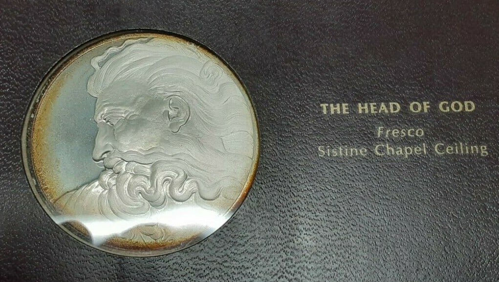 The Head of God Sterling Silver Medal from Genius of Michelangelo Series: The Head of God Sterling Silver Medal from Genius of Michelangelo Series This Franklin Mint Genius of Michelangelo proof medal, titled 'The Head of God,' was produced in 1970 as part of a limited silv