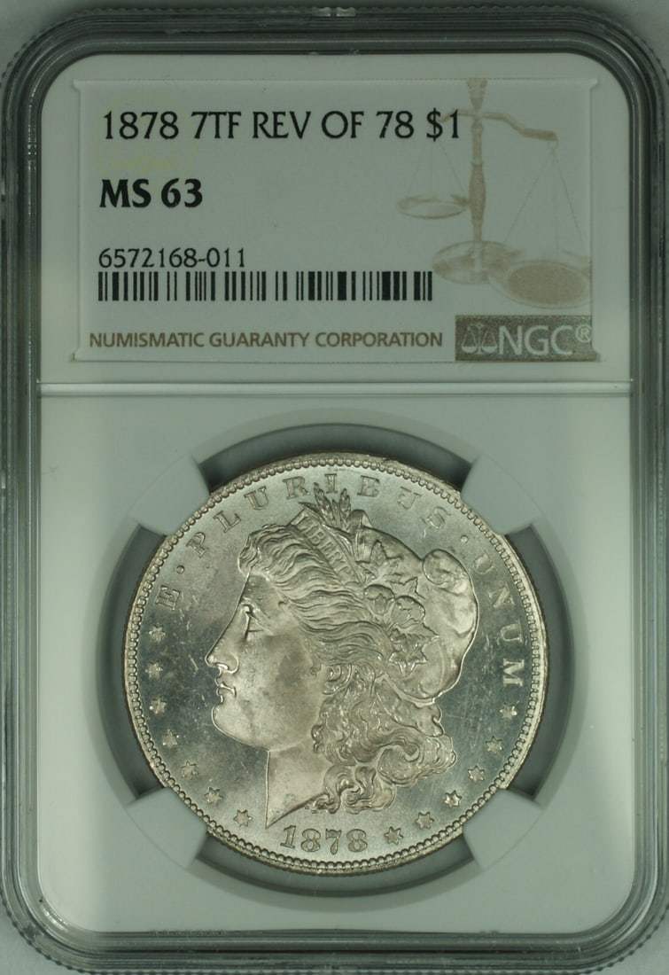 NGC MS-63+ Proof-Like 1878 Morgan Silver Dollar 7 Tail Feathers Reverse of 78: NGC MS-63+ Proof-Like 1878 Morgan Silver Dollar 7 Tail Feathers Reverse of 78 This 1878 Morgan Silver Dollar features the 7 Tail Feathers Reverse of 78 design. Certified by NGC as MS-63+ with proof-li