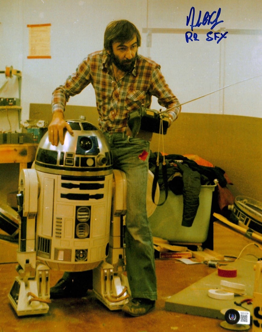 11x14 Star Wars Empire Signed Photo Andrew Kelly R2-D2 SFX Beckett Authenticated: 11x14 Star Wars Empire Signed Photo Andrew Kelly R2-D2 SFX Beckett Authenticated This 11x14 photograph is autographed by Andrew Kelly, a production crew member who contributed to building droids, spec