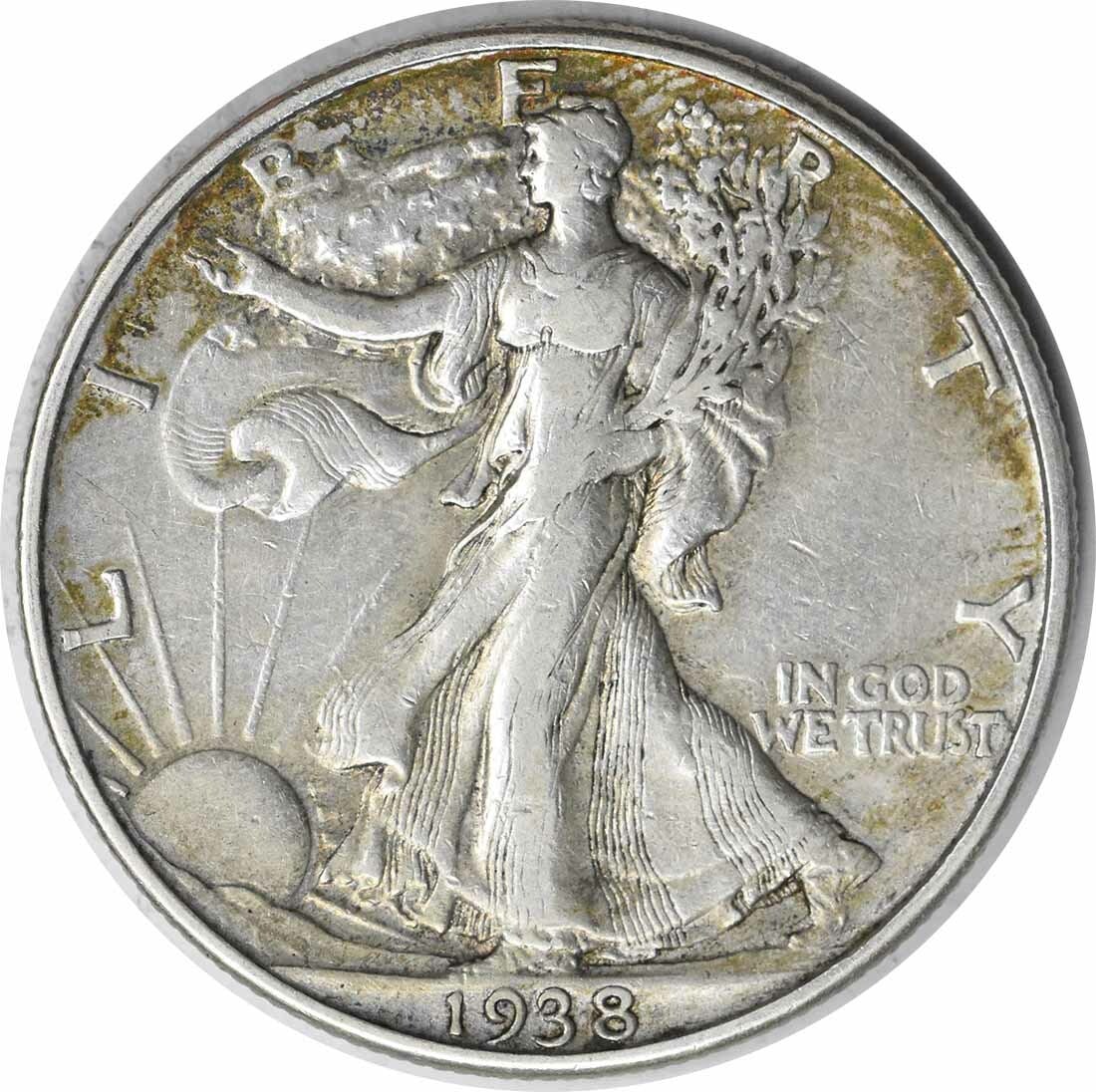 1938-D Walking Liberty Half Dollar 50C XF Uncertified Silver Coin: 1938-D Walking Liberty Half Dollar 50C XF Uncertified Silver Coin This 1938-D Walking Liberty Silver Half Dollar is a remarkable collectible, showcasing the classic design by Adolph Alexander Weinman.