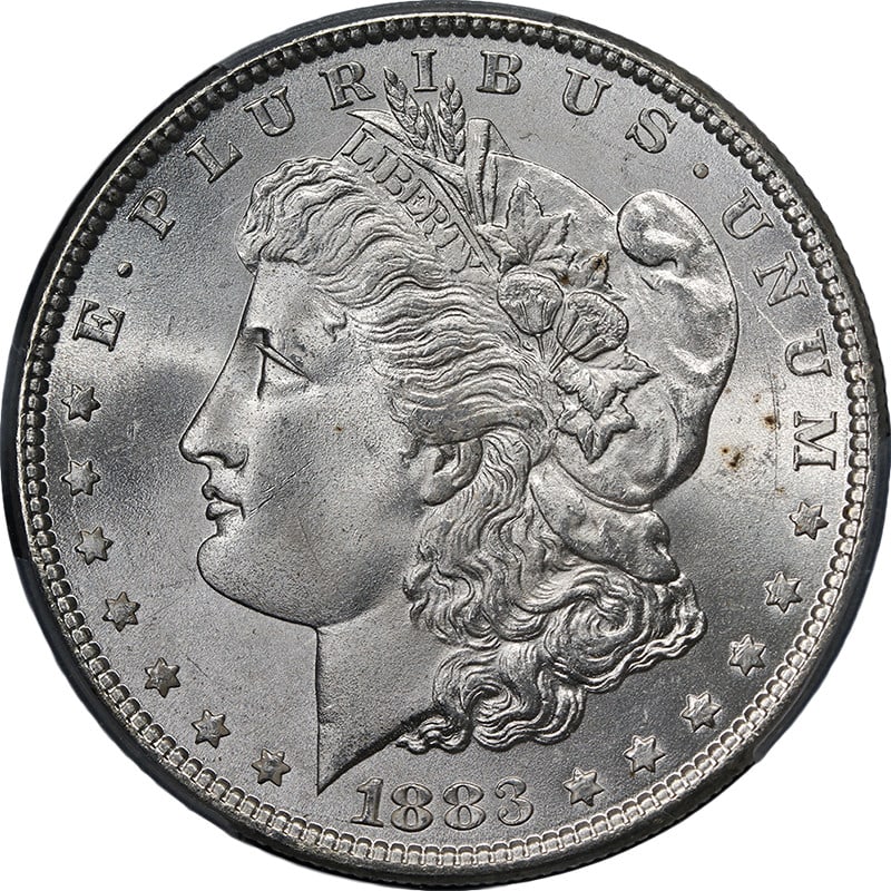 PCGS MS65 1883 Philadelphia Morgan Dollar Silver Coin Superb Luster: PCGS MS65 1883 Philadelphia Morgan Dollar Silver Coin Superb Luster This original 1883-P Morgan Silver Dollar is graded PCGS MS65 and features a blast white appearance with outstanding luster and a st