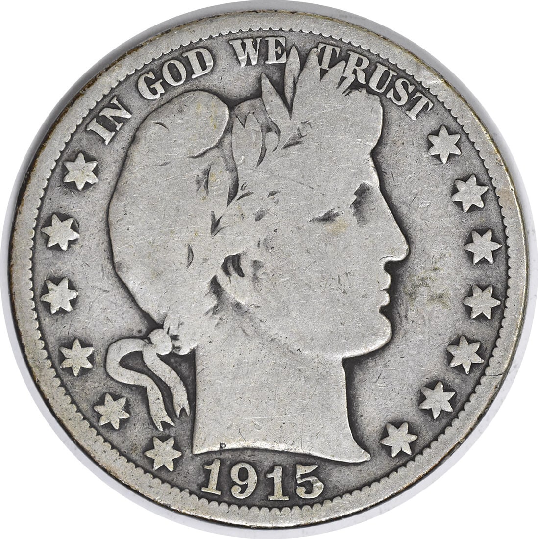 1915 Barber Silver Half Dollar 50C VG Uncertified Philadelphia Mint: 1915 Barber Silver Half Dollar 50C VG Uncertified Philadelphia Mint This 1915 Barber Silver Half Dollar showcases a classic design by Charles E. Barber, featuring a composition of 90% silver and 10% c
