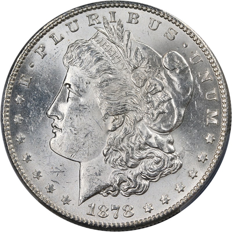 PCGS MS63 1878-S Morgan Dollar Brilliant Uncirculated Silver Coin: PCGS MS63 1878-S Morgan Dollar Brilliant Uncirculated Silver Coin This original 1878-S Morgan Silver Dollar offers exceptional eye appeal with a brilliant blast white appearance, fantastic luster, and