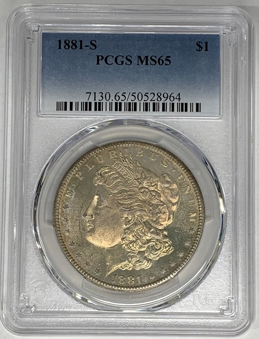 PCGS MS65 1881-S Morgan Dollar Silver Toned Uncirculated Coin: PCGS MS65 1881-S Morgan Dollar Silver Toned Uncirculated Coin This is an 1881-S Morgan Silver Dollar from the United States, featuring attractive toning. The coin is uncirculated and graded MS 65 by P