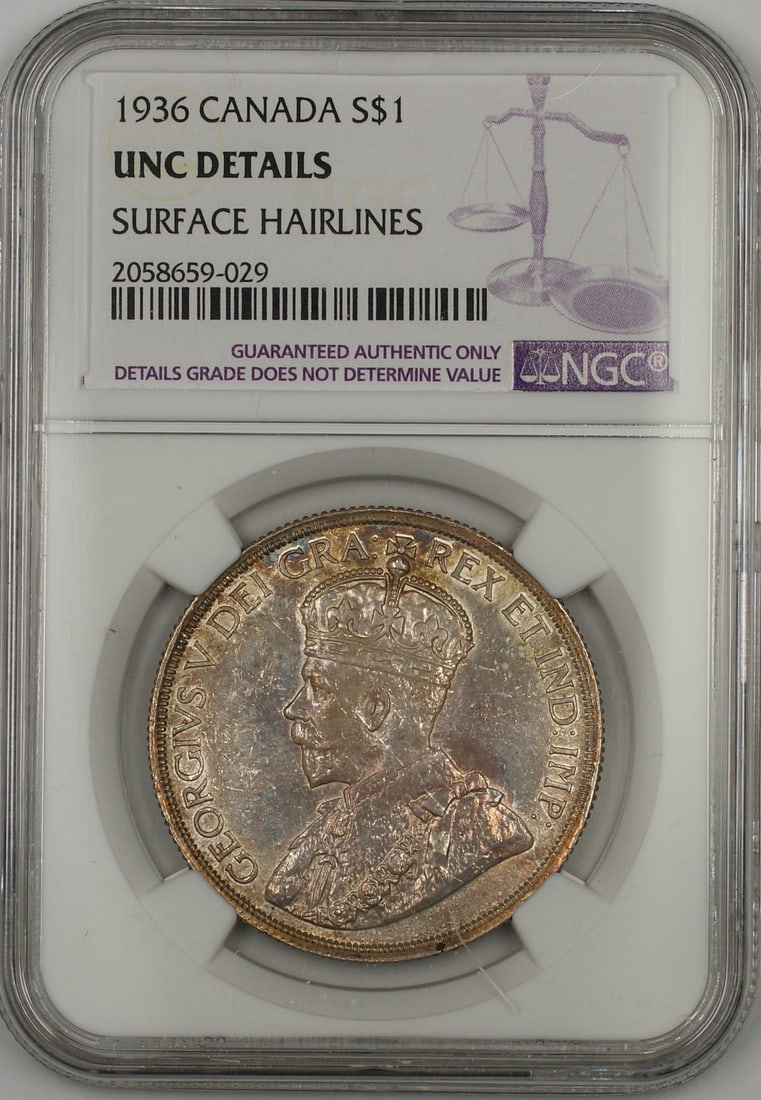 1936 Silver Canada Dollar NGC Uncirculated With Surface Hairlines: 1936 Silver Canada Dollar NGC Uncirculated With Surface Hairlines This 1936 Canada Silver $1 Dollar coin has been graded by NGC as Uncirculated Details with surface hairlines. It is an uncirculated si