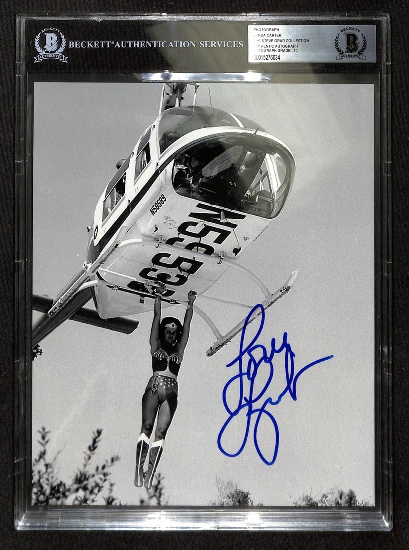 Lynda Carter Signed 8x10 Photo Wonder Woman BAS Auto Grade 10: Lynda Carter Signed 8x10 Photo Wonder Woman BAS Auto Grade 10 This is an original 8x10 color photograph featuring Lynda Carter as Wonder Woman from the Wonder Woman TV series. The photo has been hand-