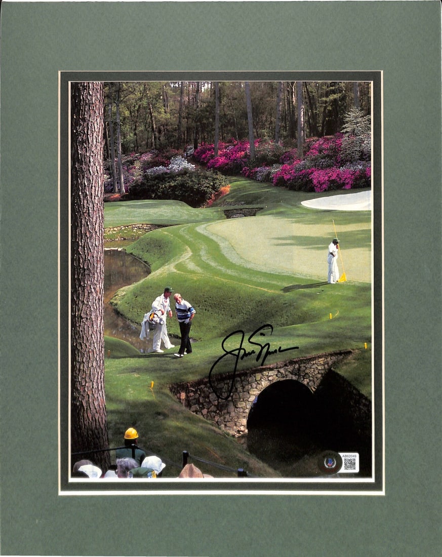 Jack Nicklaus Autographed Magazine Photo Augusta Masters Beckett Authenticated: Jack Nicklaus Autographed Magazine Photo Augusta Masters Beckett Authenticated This is an original 8 1/2 x 11 inch magazine photograph signed by golf legend Jack Nicklaus in black permanent marker. Th