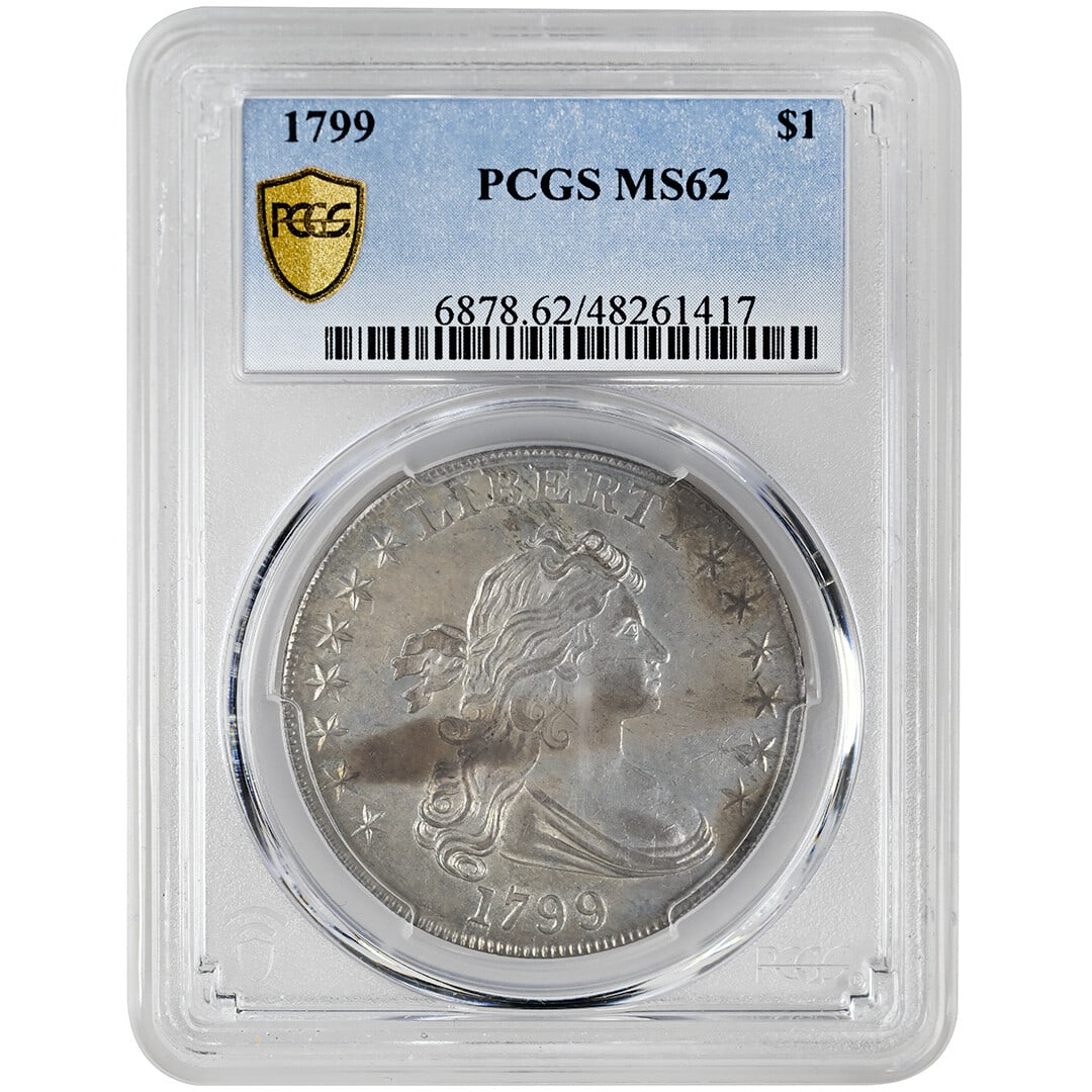 1799 Draped Bust Silver Dollar PCGS MS62 Heraldic Eagle Type 2: 1799 Draped Bust Silver Dollar PCGS MS62 Heraldic Eagle Type 2 This 1799 Draped Bust Dollar is a rare United States silver coin graded MS62 by PCGS. Struck at the Philadelphia Mint, it features the Ty