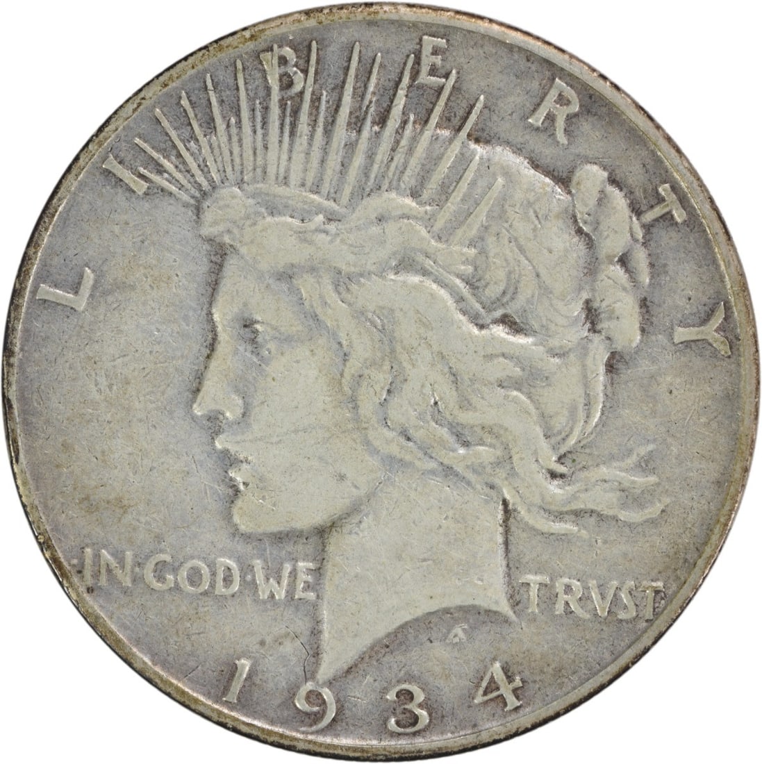 1934-S Peace Silver Dollar VF Uncertified 90% Silver Coin: 1934-S Peace Silver Dollar VF Uncertified 90% Silver Coin This 1934-S Peace Silver Dollar is a sought-after piece for collectors, featuring a design by Anthony de Francisci. The coin is circulated, cl