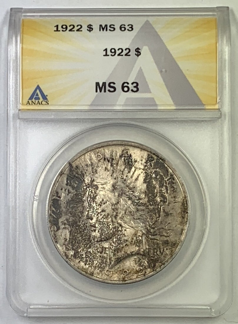 ANACS MS 63 Graded 1922 Peace Silver Dollar Uncirculated US Coin: ANACS MS 63 Graded 1922 Peace Silver Dollar Uncirculated US Coin This is a 1922 Peace Silver Dollar coin from the United States, composed of silver and graded MS 63 by ANACS. The coin is uncirculated