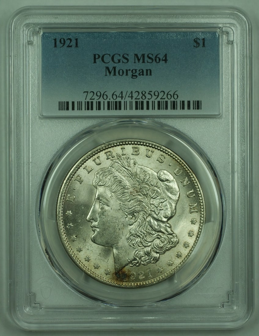 PCGS MS-64 1921 Morgan Dollar Silver Coin Philadelphia Mint: PCGS MS-64 1921 Morgan Dollar Silver Coin Philadelphia Mint This 1921 Morgan Silver Dollar features a denomination of $1 and is graded MS-64 by PCGS. Struck in Philadelphia, it is composed of 90% silv