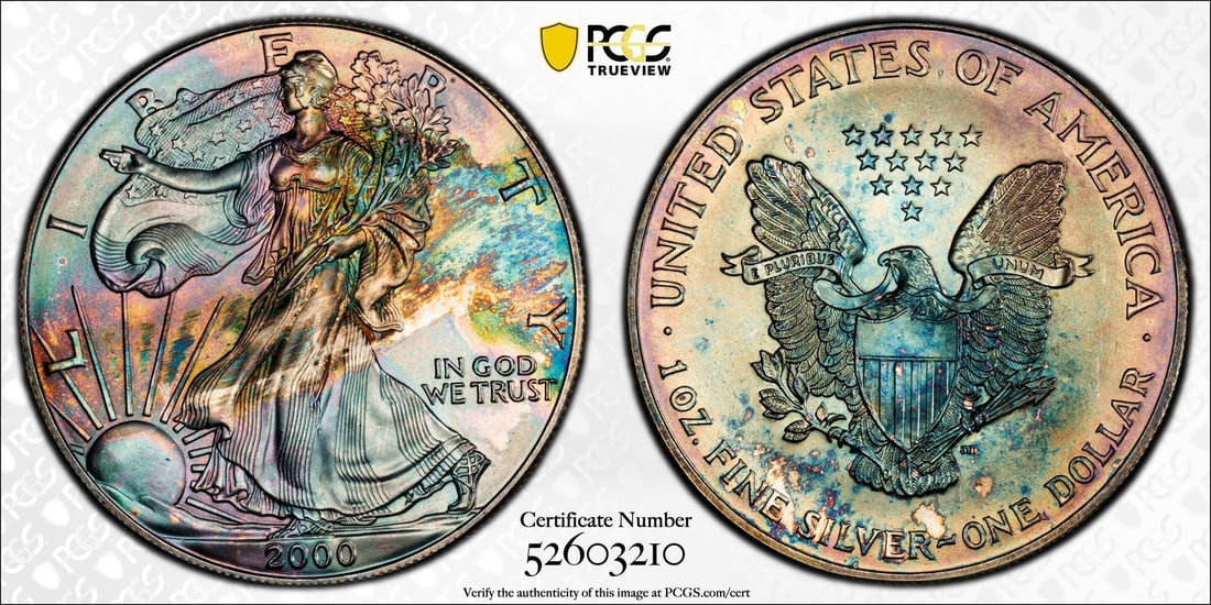 2000 MS67 Rainbow Toned Silver Eagle $1 ASE PCGS Certified: 2000 MS67 Rainbow Toned Silver Eagle $1 ASE PCGS Certified This stunning 2000 American Silver Eagle coin showcases a beautiful rainbow toning, making it a unique addition to any collection. Crafted fr