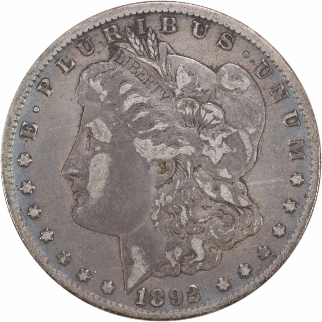 1892-O Morgan Silver Dollar VF Uncertified 90% Silver Coin: 1892-O Morgan Silver Dollar VF Uncertified 90% Silver Coin This 1892-O Morgan Silver Dollar features a striking design by George T. Morgan and is a must-have for collectors. The coin is graded as Very
