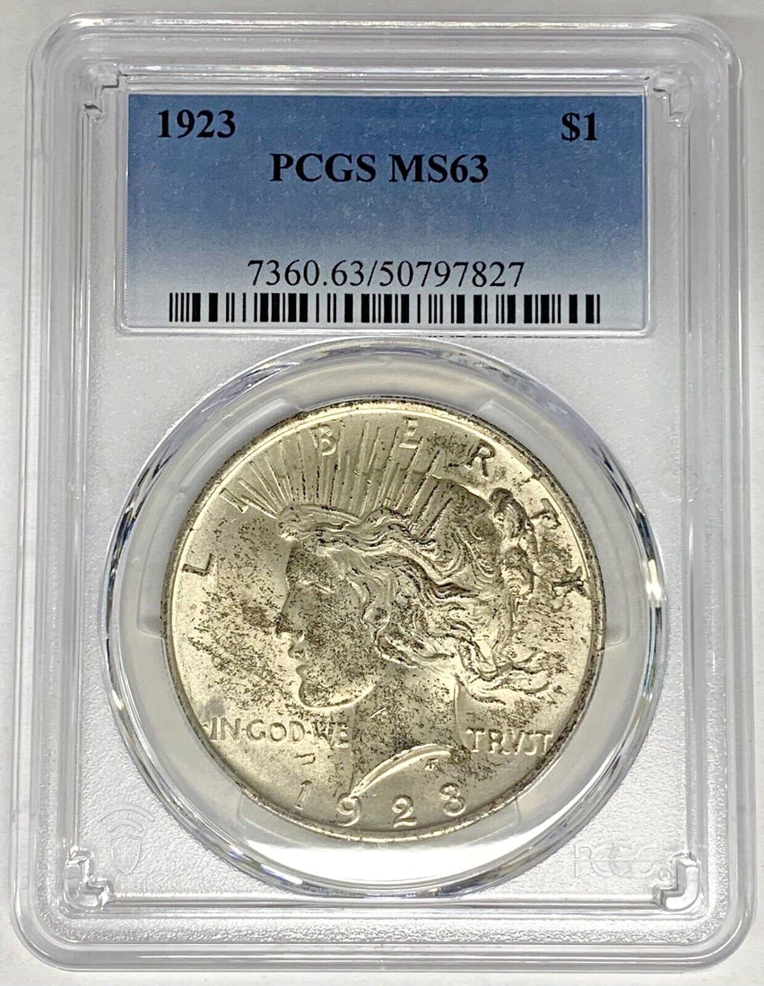 PCGS MS 63 Peace Dollar 1923 Silver $1 Uncirculated Toned Coin: PCGS MS 63 Peace Dollar 1923 Silver $1 Uncirculated Toned Coin This is a 1923 Peace Silver Dollar coin from the United States, featuring an attractive toned finish. Certified by PCGS and graded MS 63,