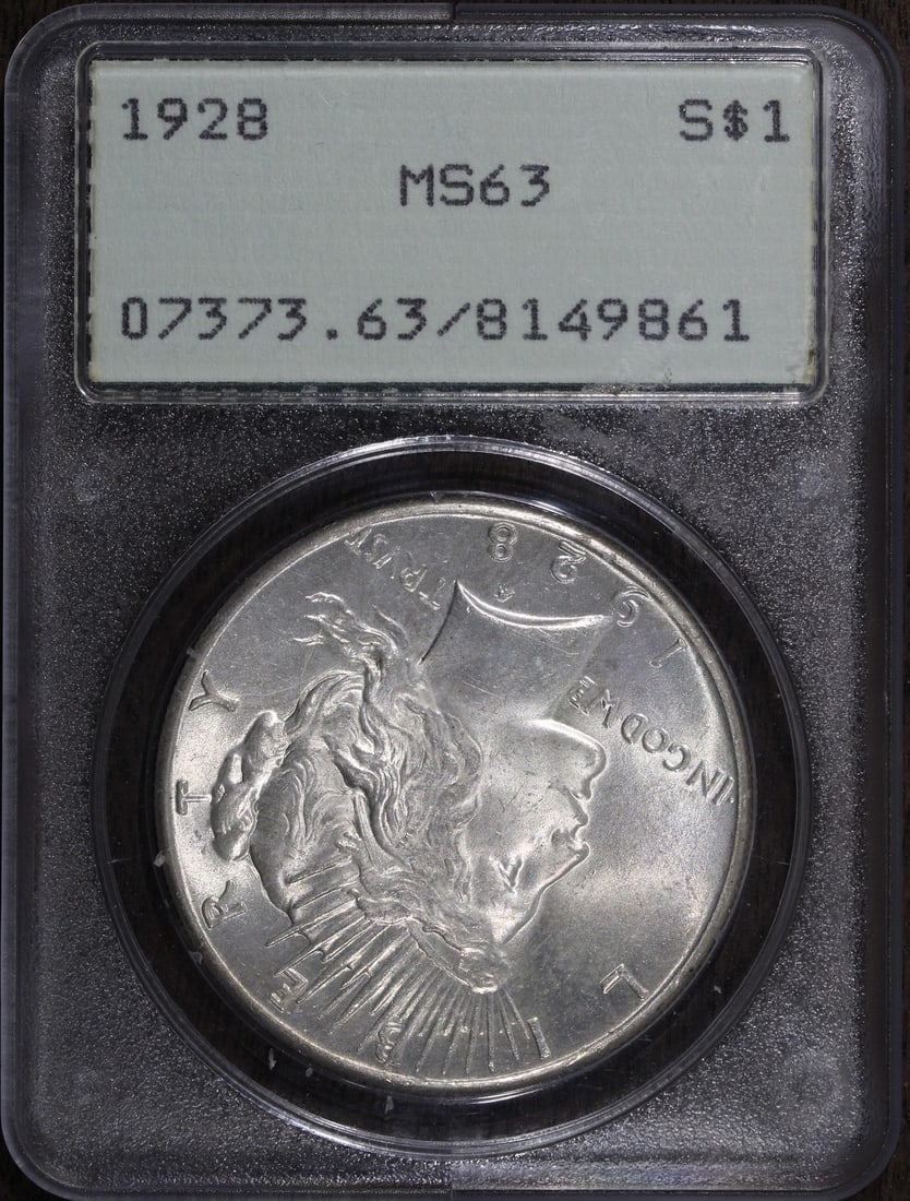 1928 Peace Silver Dollar MS63 PCGS Rattler Key Date: 1928 Peace Silver Dollar MS63 PCGS Rattler Key Date This 1928 Peace Silver Dollar is a notable addition for any coin collector. Graded MS63 by PCGS, this uncirculated coin features a beautiful silver