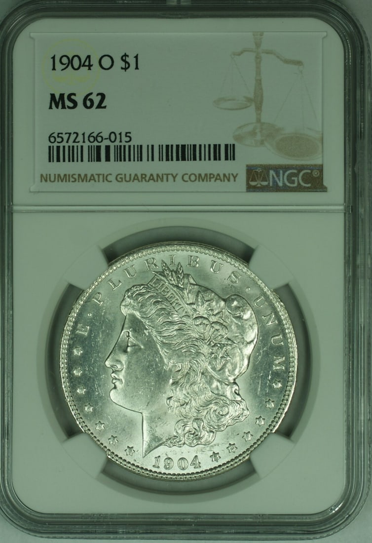 NGC MS-62 1904-O Morgan Dollar Silver Coin from New Orleans Mint: NGC MS-62 1904-O Morgan Dollar Silver Coin from New Orleans Mint This 1904-O Morgan Silver Dollar features a $1 denomination and was minted in New Orleans. It is certified by NGC with a grade of MS 62