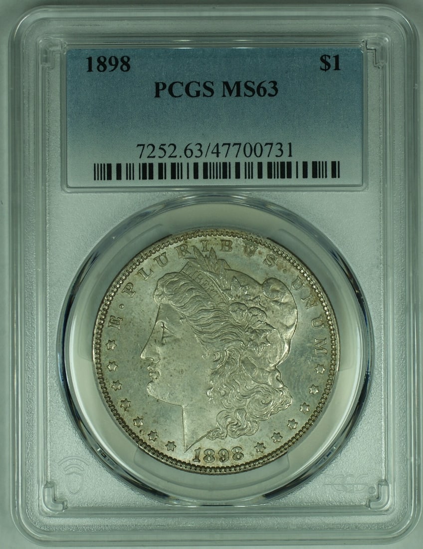 1898 Morgan Silver Dollar PCGS MS63 Proof-Like Toned Uncirculated Coin: 1898 Morgan Silver Dollar PCGS MS63 Proof-Like Toned Uncirculated Coin This 1898 Morgan Silver Dollar is a proof-like coin graded MS 63 by PCGS. The coin is uncirculated and features attractive toning