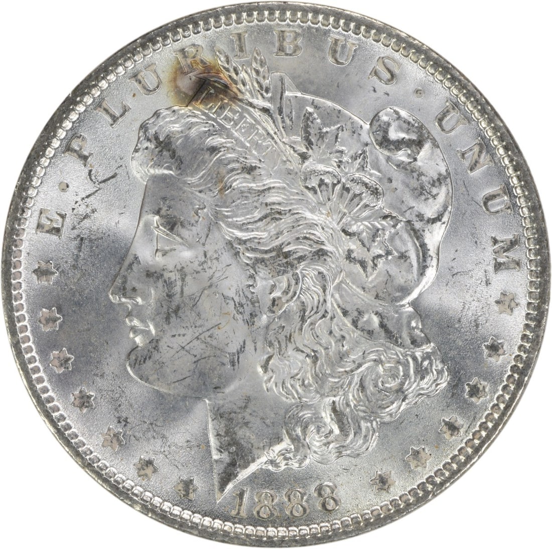 1888 Morgan Silver Dollar Brilliant Uncirculated Silver Coin: 1888 Morgan Silver Dollar Brilliant Uncirculated Silver Coin This 1888 Morgan Silver Dollar is an uncirculated coin that exemplifies the beauty and craftsmanship of American numismatics. With a denomi