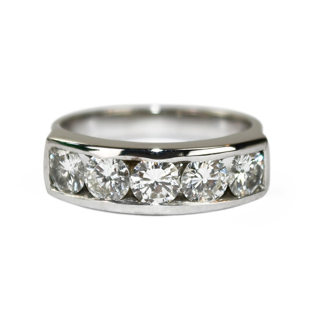 Diamond Band Ring in 14k White Gold 1.50ct Round Brilliant Stones Size 6.5: Diamond Band Ring in 14k White Gold 1.50ct Round Brilliant Stones Size 6.5 This ladies' band ring is crafted from 14k white gold and features a total of 1.50 carats of round brilliant cut natural diam