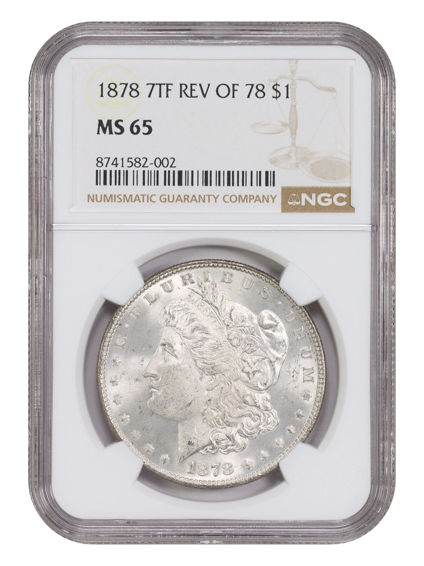 NGC MS65 1878 Morgan Dollar 7 Tail Feathers Reverse Variety: NGC MS65 1878 Morgan Dollar 7 Tail Feathers Reverse Variety This is an 1878 Morgan Dollar featuring the 7 Tail Feathers (Reverse of 1878) variety. Graded MS65 by NGC, this coin is uncirculated and ori