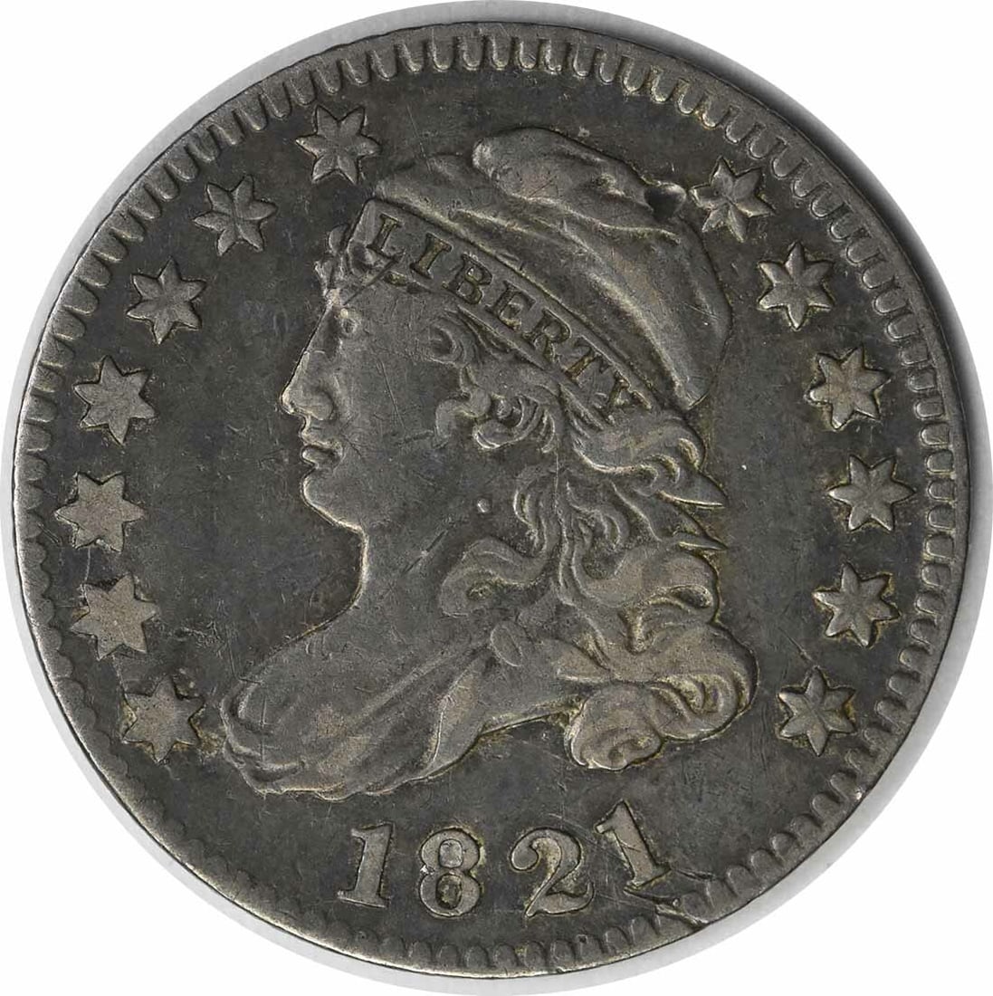 1821 Capped Bust Large Date Silver Dime Extra Fine Uncertified: 1821 Capped Bust Large Date Silver Dime Extra Fine Uncertified This 1821 Capped Bust Dime features a large date design and is composed of 89.2% silver and 10.8% copper. Designed by John Reich and mint