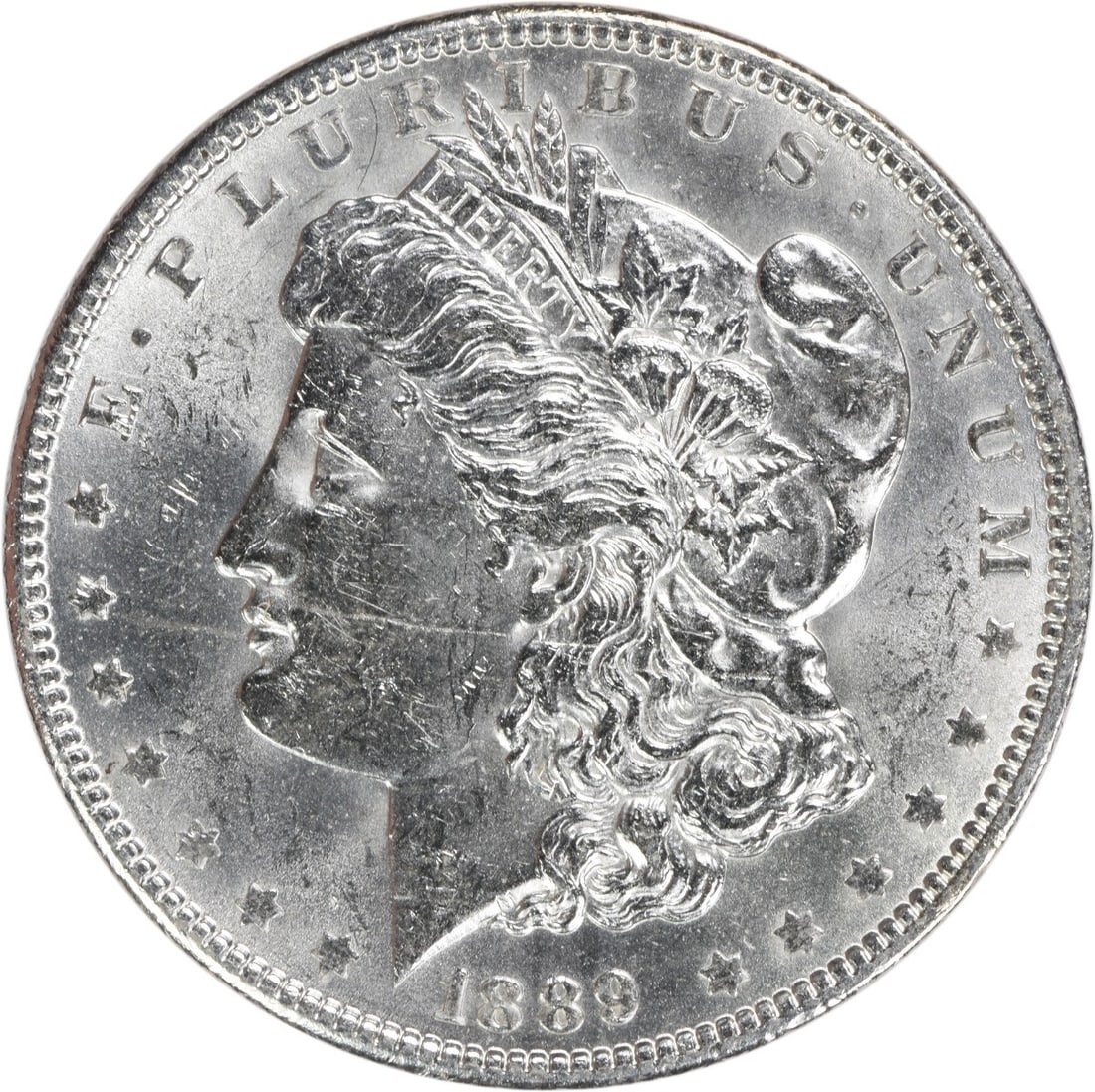 1889 Morgan Silver Dollar BU Uncertified Silver Coin: 1889 Morgan Silver Dollar BU Uncertified Silver Coin This 1889 Morgan Silver Dollar is an uncirculated coin featuring a beautiful shine and detail, classified as Brilliant Uncirculated (BU). Minted in