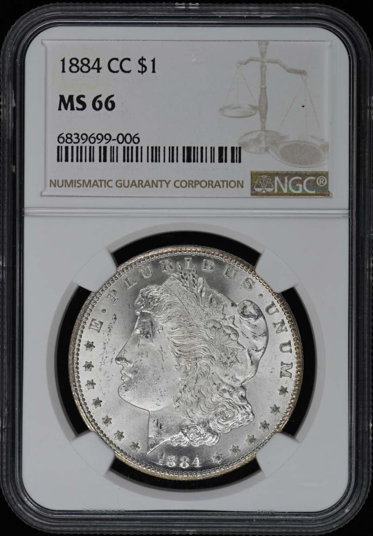 1884 CC Morgan Dollar NGC MS66 Uncirculated Coin: 1884 CC Morgan Dollar NGC MS66 Uncirculated Coin This 1884-CC Morgan Dollar is an outstanding example of the renowned silver dollar series. Graded MS66 by NGC, this coin is in uncirculated condition,