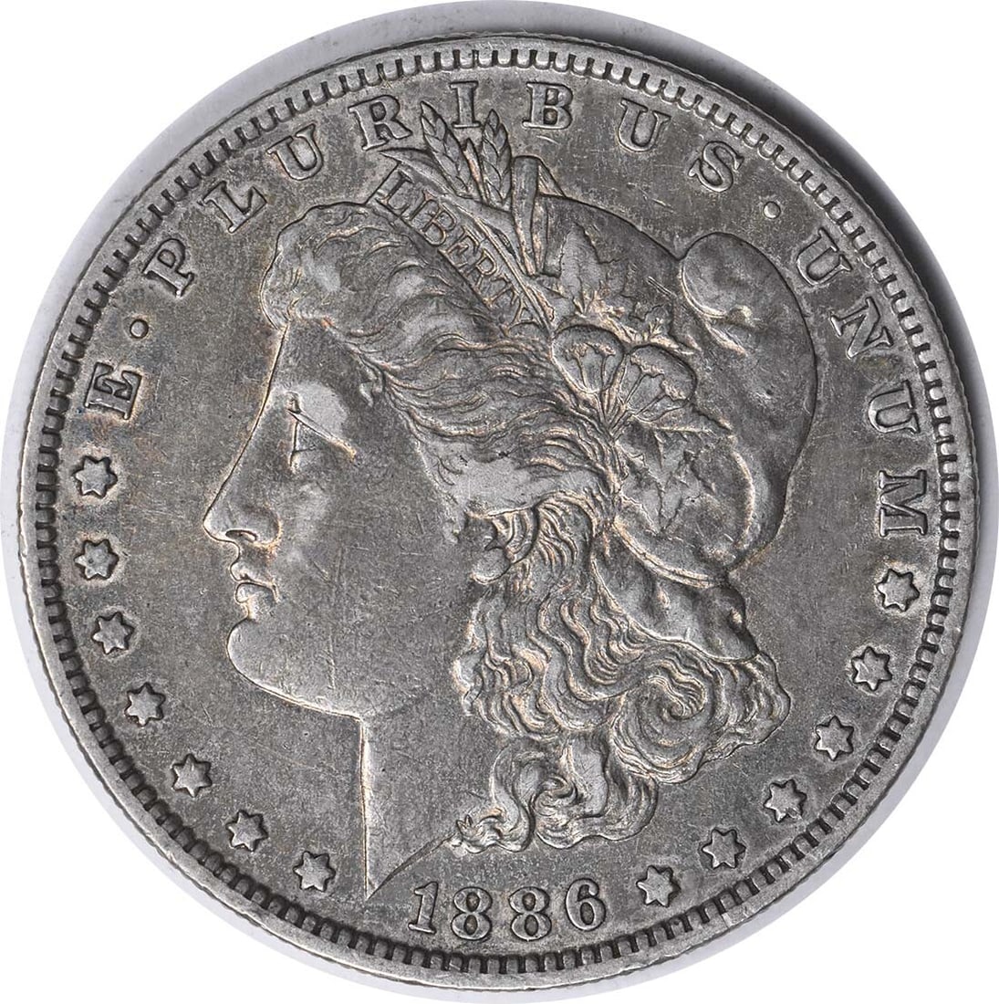 1886-O VAM 1A Morgan Silver Dollar Uncertified 90% Silver Coin: 1886-O VAM 1A Morgan Silver Dollar Uncertified 90% Silver Coin This 1886-O VAM 1A Morgan Silver Dollar is a remarkable piece of numismatic history. Featuring a striking design by George T. Morgan, thi