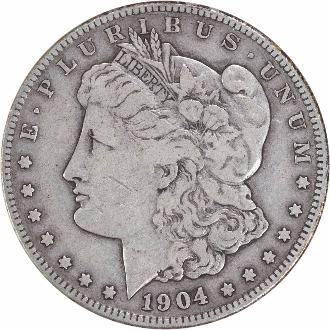 1904-S Morgan Silver Dollar VF 90% Silver Uncertified Coin: 1904-S Morgan Silver Dollar VF 90% Silver Uncertified Coin This 1904-S Morgan Silver Dollar showcases the exquisite craftsmanship of George T. Morgan, featuring a stunning design that has captivated c