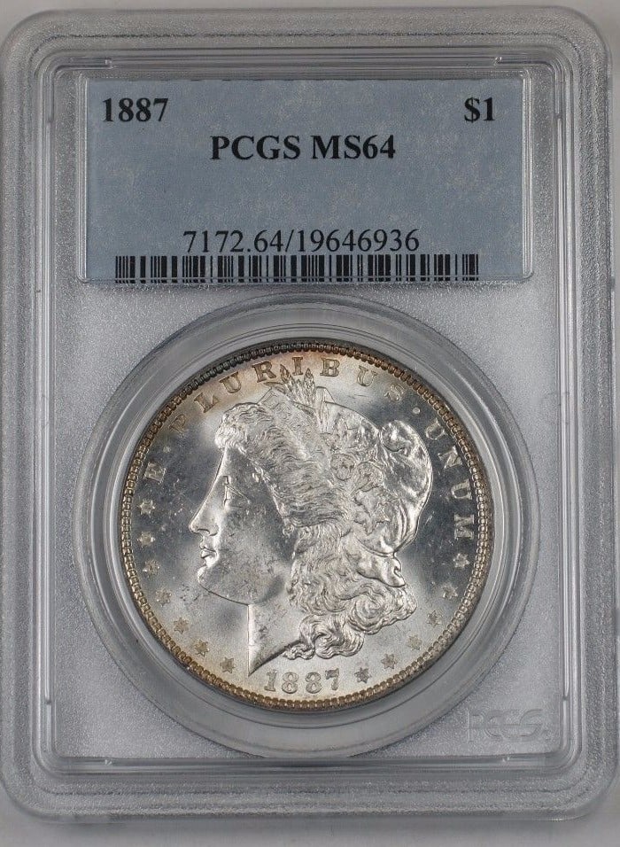 1887 Morgan Dollar PCGS MS64 Silver Coin Light Toning Philadelphia Mint: 1887 Morgan Dollar PCGS MS64 Silver Coin Light Toning Philadelphia Mint This 1887 US Morgan Silver Dollar features a lightly toned finish and is certified by PCGS with a grade of MS 64. Minted in Phil