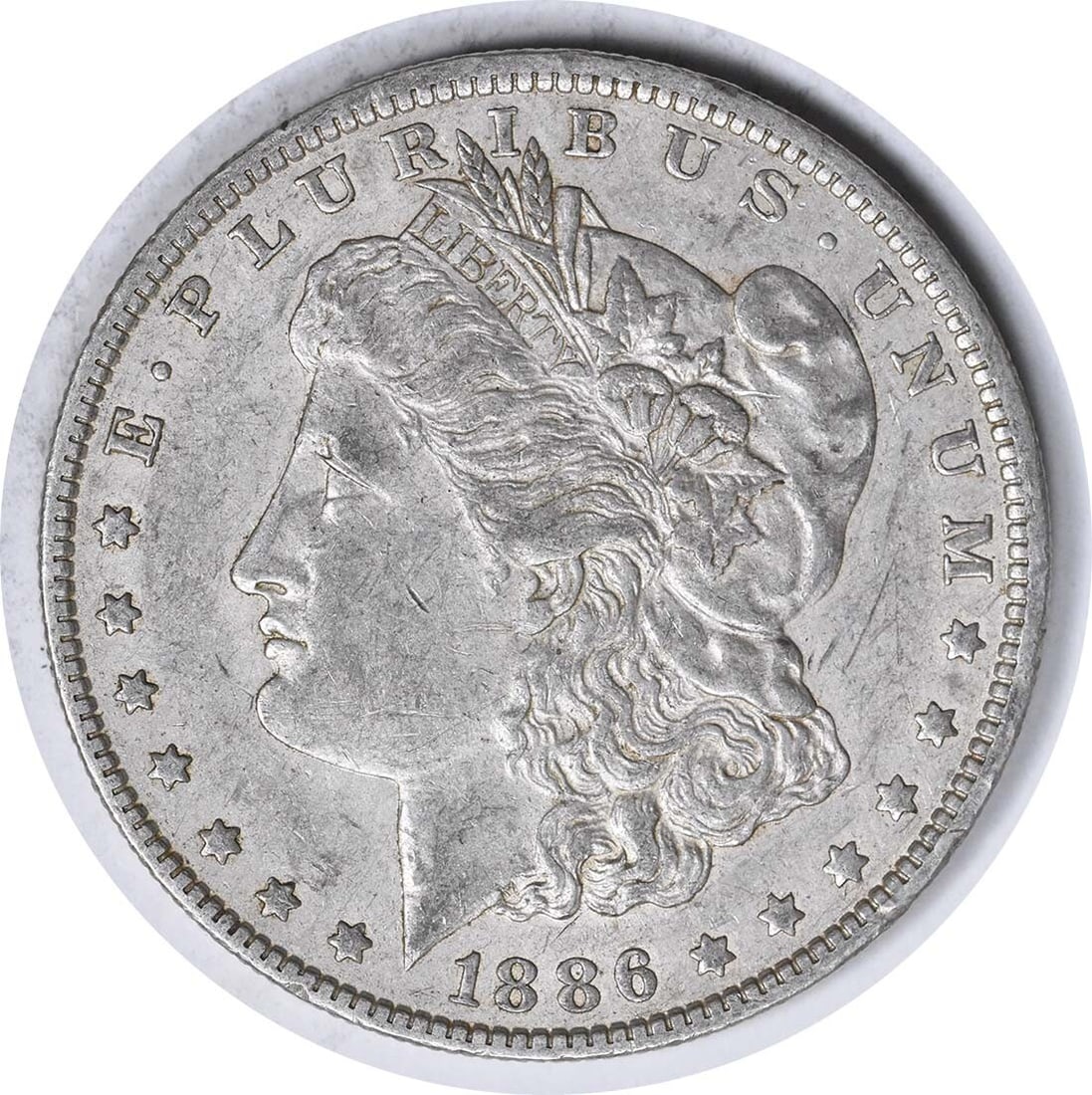 Morgan Dollar 1886-O VAM 1A Silver Coin Clashed E XF Uncertified: Morgan Dollar 1886-O VAM 1A Silver Coin Clashed E XF Uncertified This 1886-O Morgan Silver Dollar is a VAM 1A variety featuring clashed E markings. Struck at the New Orleans Mint, this circulated coin