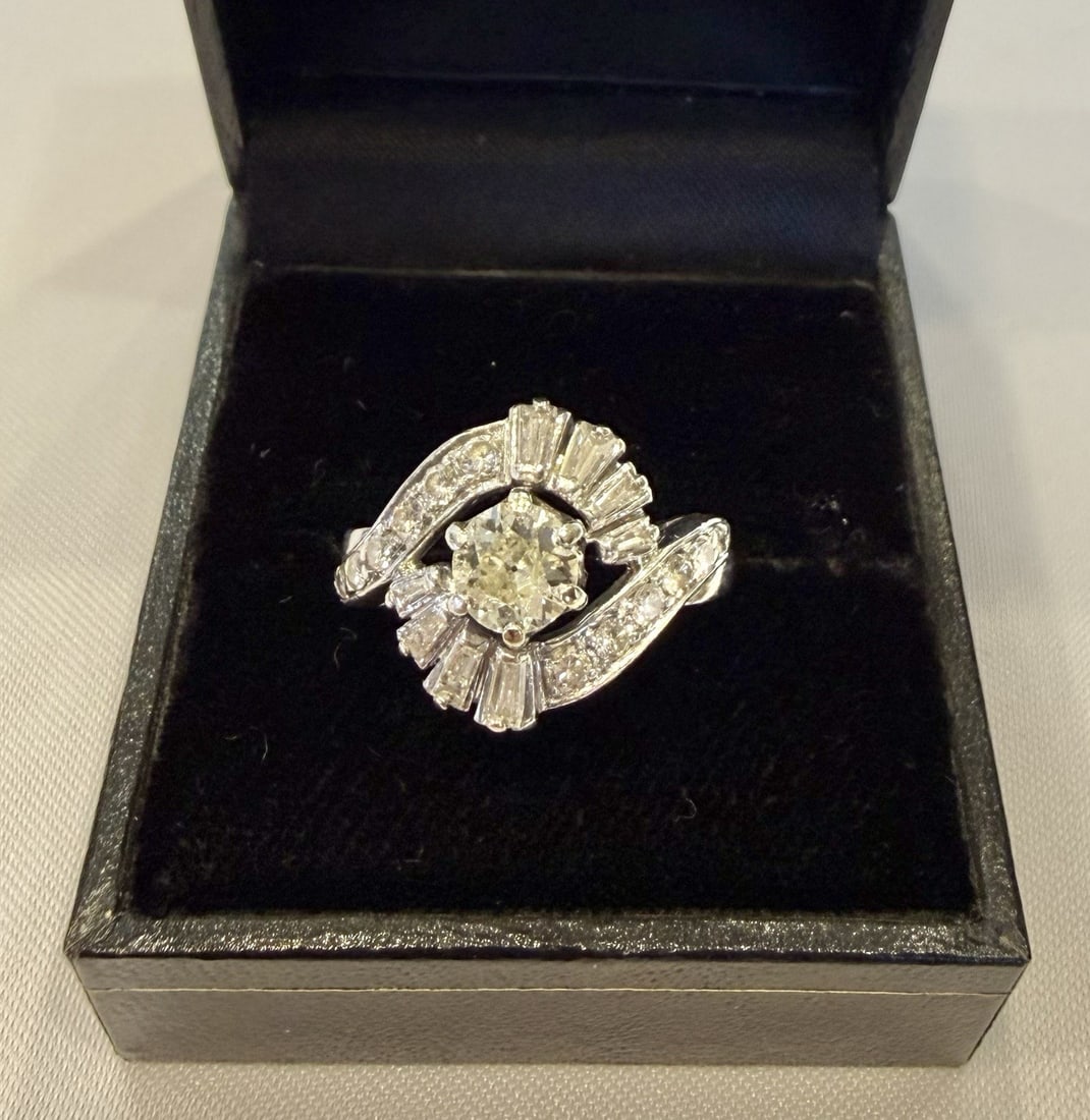 French Platinum Ring with Diamonds Size 6.5: French Platinum Ring with Diamonds Size 6.5 This elegant French ring is crafted from 900 platinum and features approximately 0.65 carats of JVS diamonds. The ring showcases fine detail, design, and wo