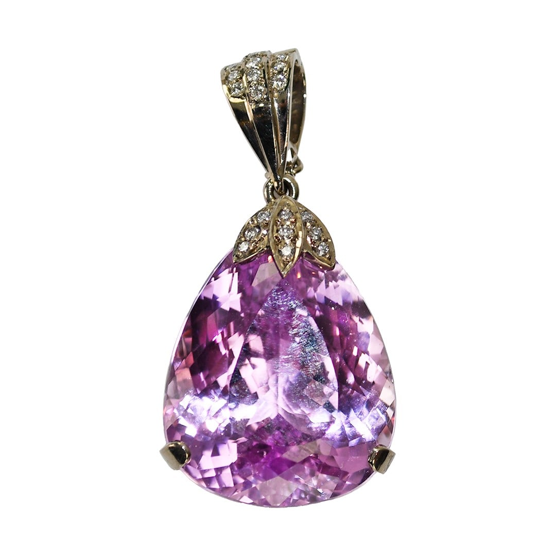 Kunzite and Diamond Pendant in 18k White Gold 31g Pink Stone: Kunzite and Diamond Pendant in 18k White Gold 31g Pink Stone This custom pendant features a high-grade, intensely pink kunzite as the centerpiece, accented by round brilliant cut diamonds. Crafted fro