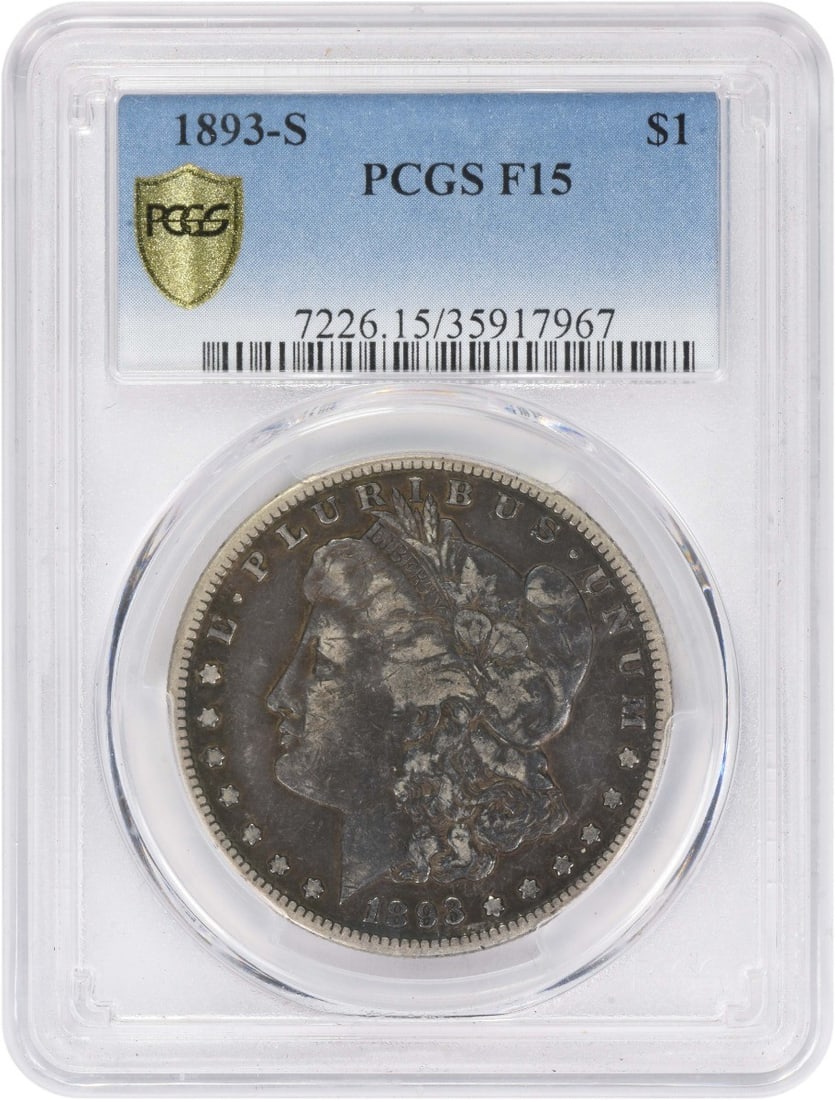 PCGS Graded 1893 San Francisco Morgan Dollar Fine 15: PCGS Graded 1893 San Francisco Morgan Dollar Fine 15 This 1893-S Morgan Silver Dollar is certified by PCGS with a grade of F15. Minted in San Francisco, it features a composition of 90% silver and 10%