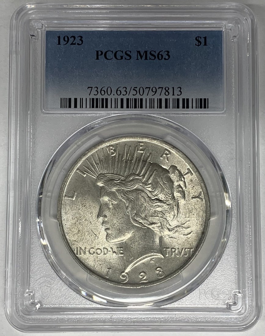 PCGS MS63 1923 Peace Dollar Silver Coin United States Certified: PCGS MS63 1923 Peace Dollar Silver Coin United States Certified This 1923 Peace Silver Dollar coin from the United States is certified by PCGS with a grade of MS 63. Composed of silver, the coin is un