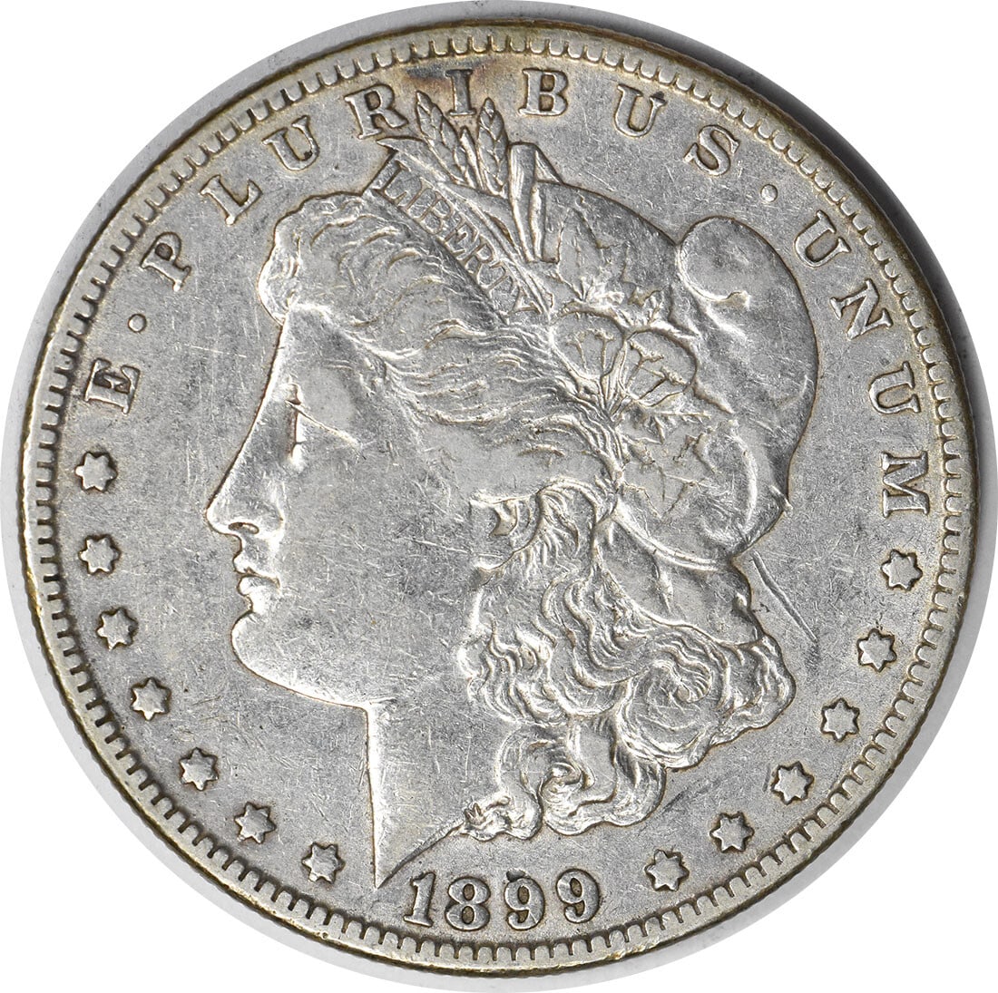 1899 VAM 6 Morgan Silver Dollar Micro O Uncertified Coin: 1899 VAM 6 Morgan Silver Dollar Micro O Uncertified Coin This 1899 VAM 6 Morgan Silver Dollar features a striking design by George T. Morgan and is a notable piece for collectors. Struck at the New Or
