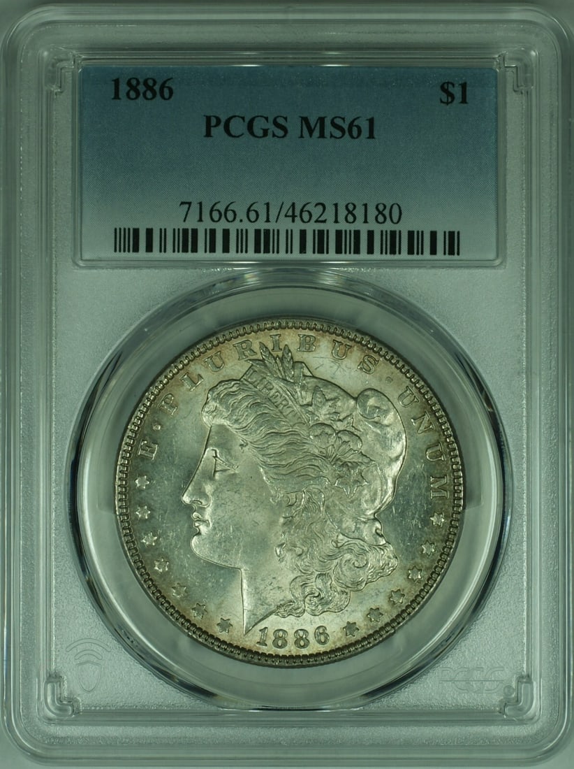 PCGS MS-61 1886 Morgan Dollar Silver Coin With Reverse Toning: PCGS MS-61 1886 Morgan Dollar Silver Coin With Reverse Toning This is an 1886 Morgan Silver Dollar graded MS-61 by PCGS, featuring reverse toning. Struck at the Philadelphia Mint, this uncirculated co