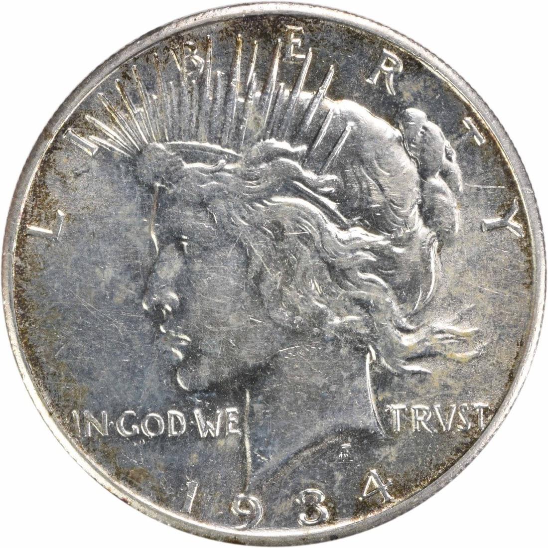1934-S Peace Silver Dollar AU Uncertified 90% Silver Coin: 1934-S Peace Silver Dollar AU Uncertified 90% Silver Coin This 1934-S Peace Silver Dollar is a remarkable collectible coin featuring a design by Anthony de Francisci. Struck at the San Francisco Mint,