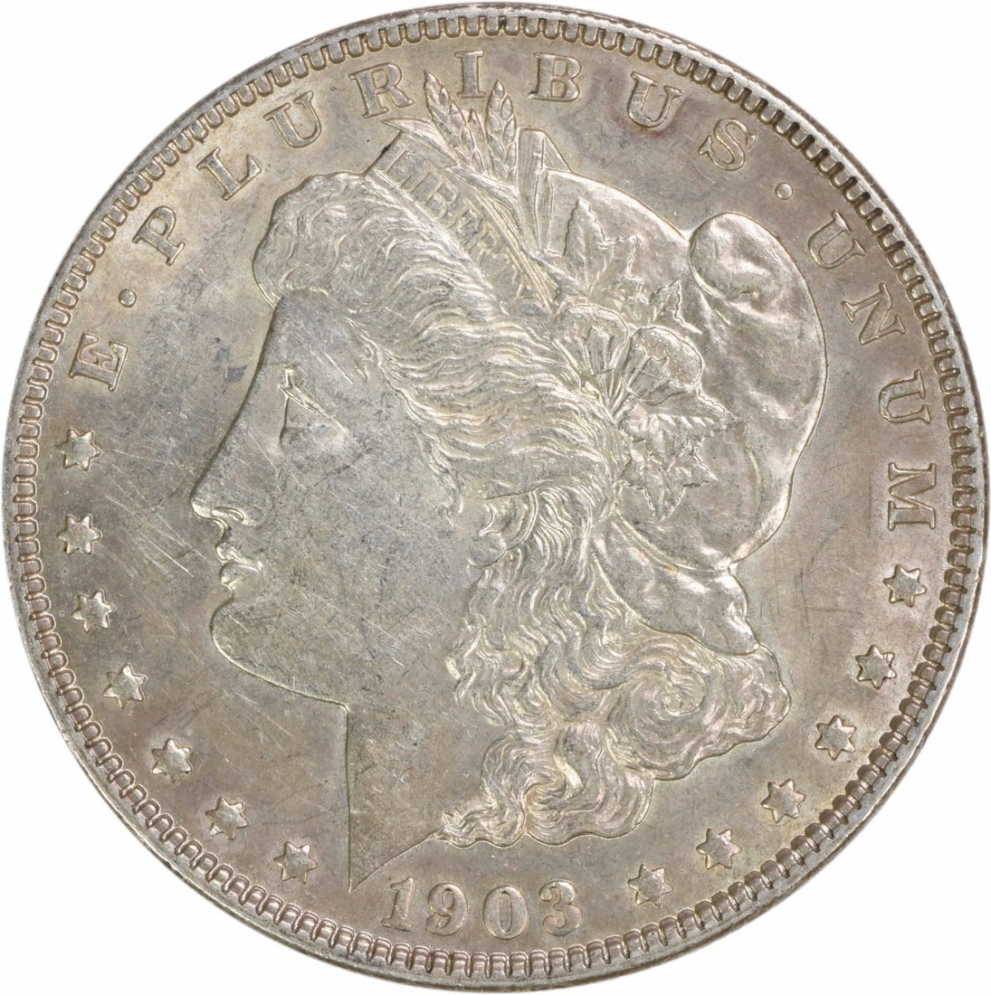 1903 Morgan Silver Dollar AU Uncertified 90% Silver Coin: 1903 Morgan Silver Dollar AU Uncertified 90% Silver Coin This 1903 Morgan Silver Dollar showcases the classic design by George T. Morgan, featuring a beautiful representation of Lady Liberty. The coin