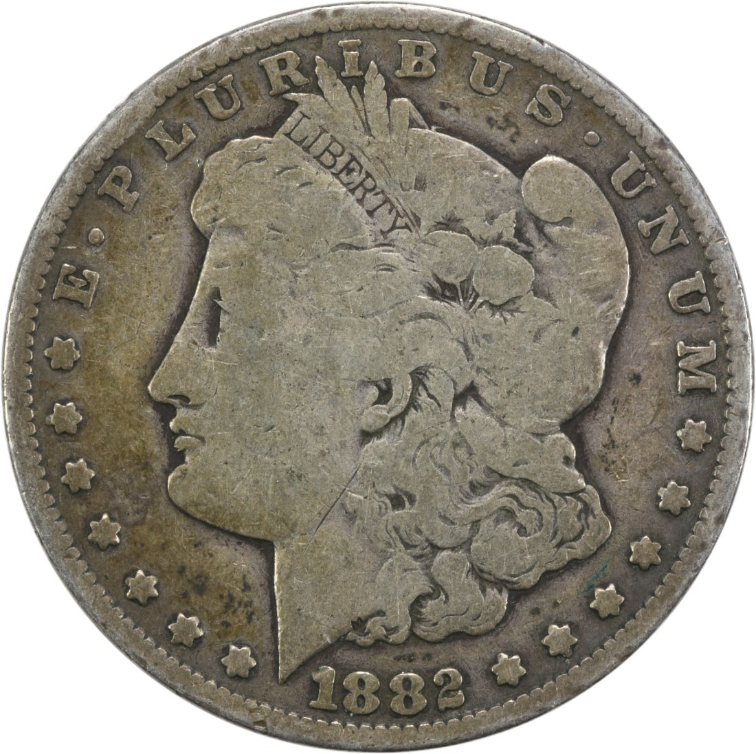 1882 Carson City Morgan Dollar VG Grade Uncertified Silver Coin: 1882 Carson City Morgan Dollar VG Grade Uncertified Silver Coin This 1882-CC Morgan Silver Dollar is a circulated coin from the United States Mint in Carson City. Composed of 90% silver and 10% copper